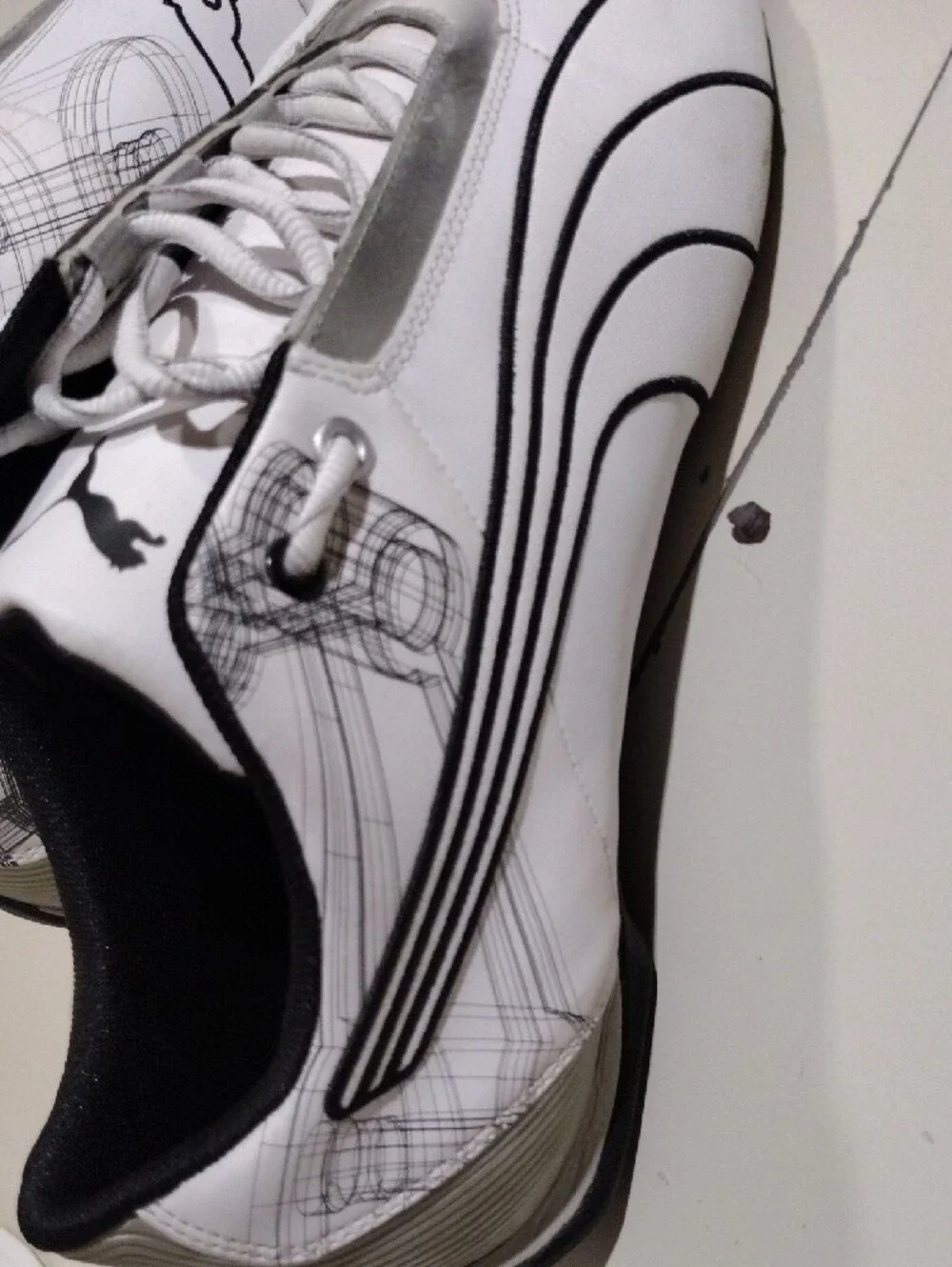Men's Puma Future Cat S1 White Sneakers with Black Logos and Graphic Details